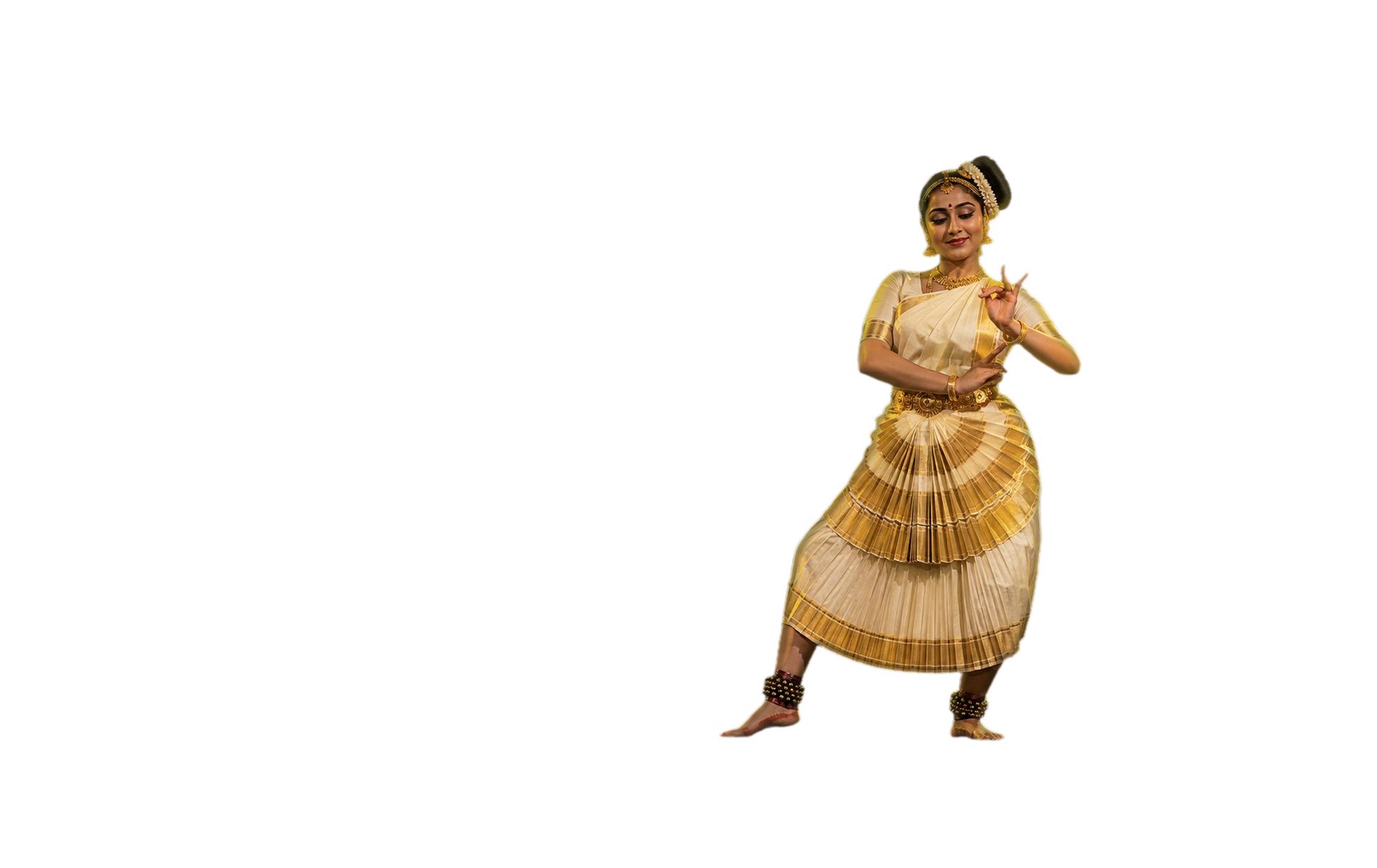 A Mohiniyattam dancer in kasavu costume on the Keraleeyam stage